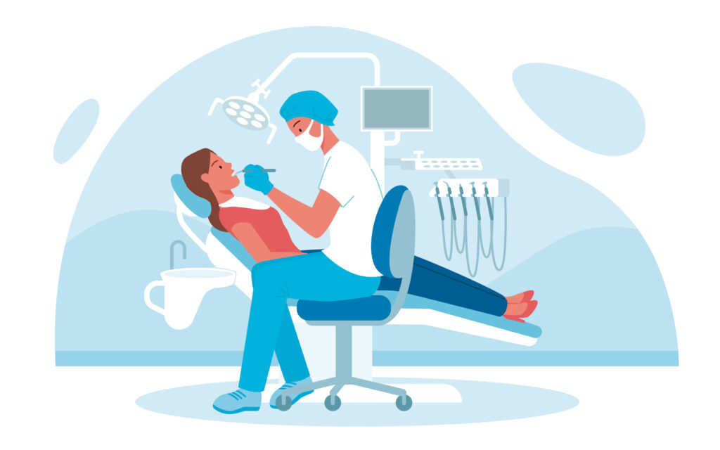 Dentista examina paciente com equipamento de iluminação numa clínica dentária.